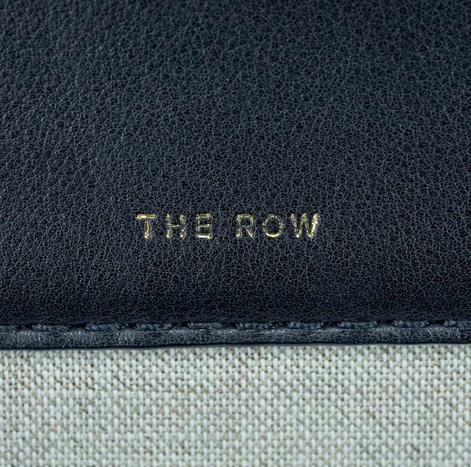 THE ROW Margaux 15 Canvas and Leather Handbag in Black and Beige