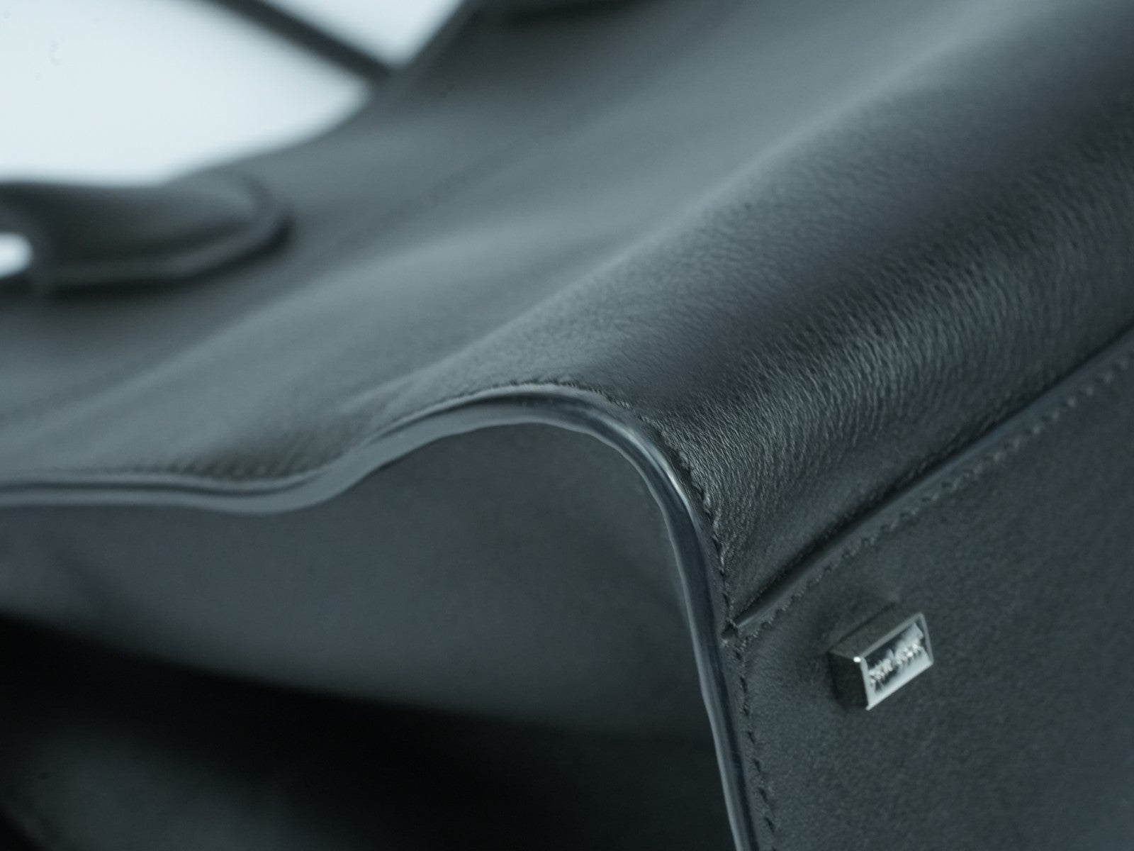 The Row Soft Margaux 15 Bag in Black saddle leather