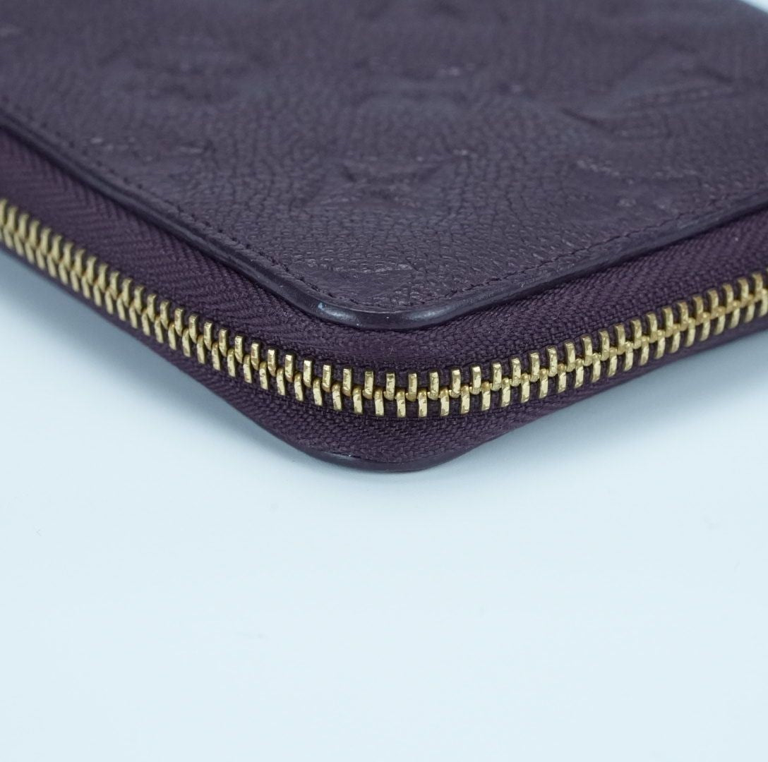 LOUIS VUITTON Monogram Empreinte Portefeuille Secrète Compact Wallet M60296