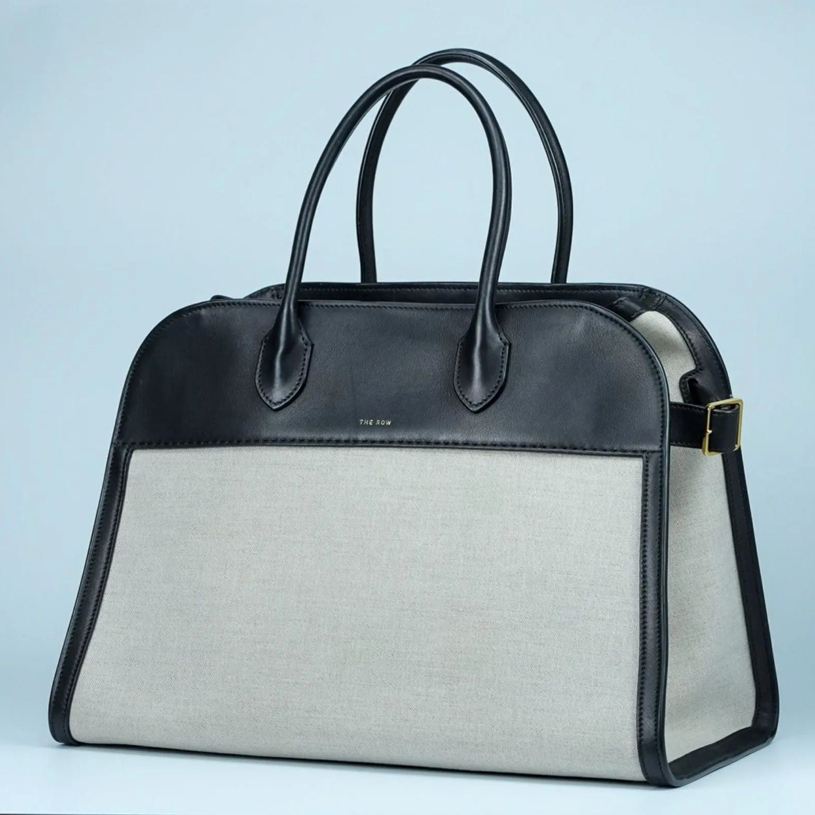 THE ROW Margaux 15 Canvas and Leather Handbag in Black and Beige