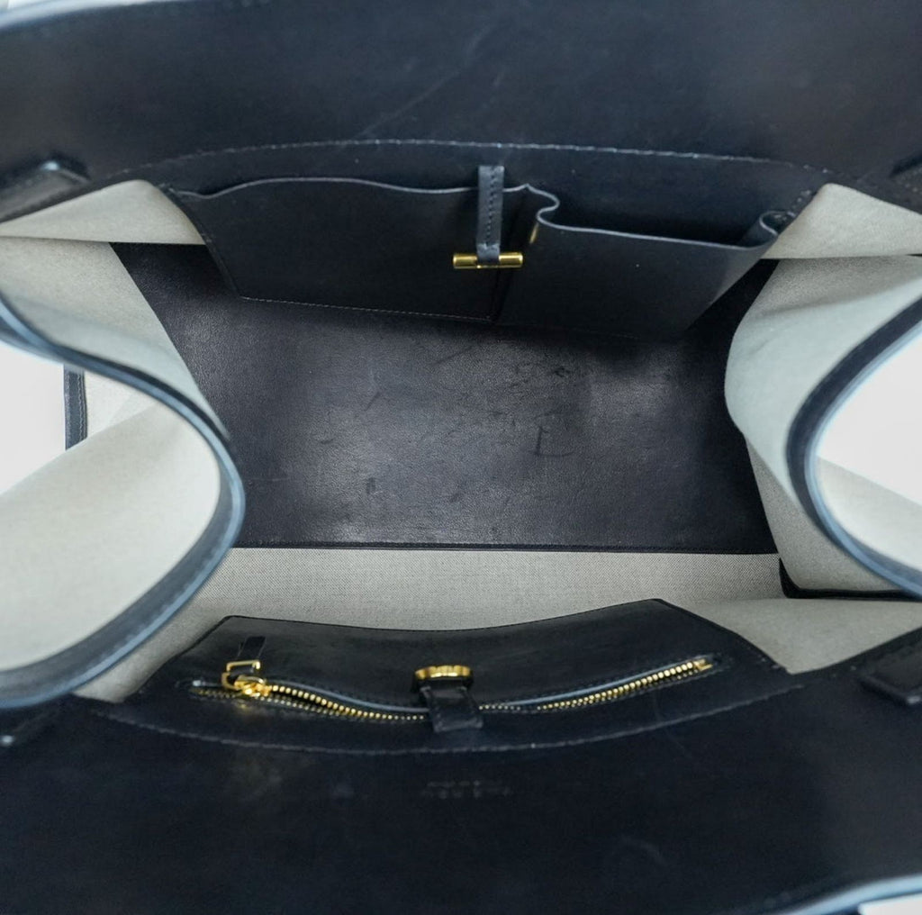 THE ROW Margaux 15 Canvas and Leather Handbag in Black and Beige