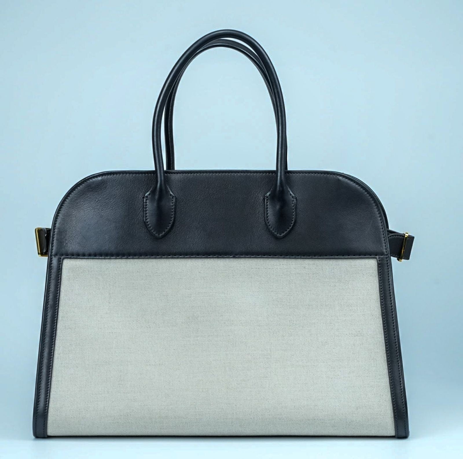 THE ROW Margaux 15 Canvas and Leather Handbag in Black and Beige