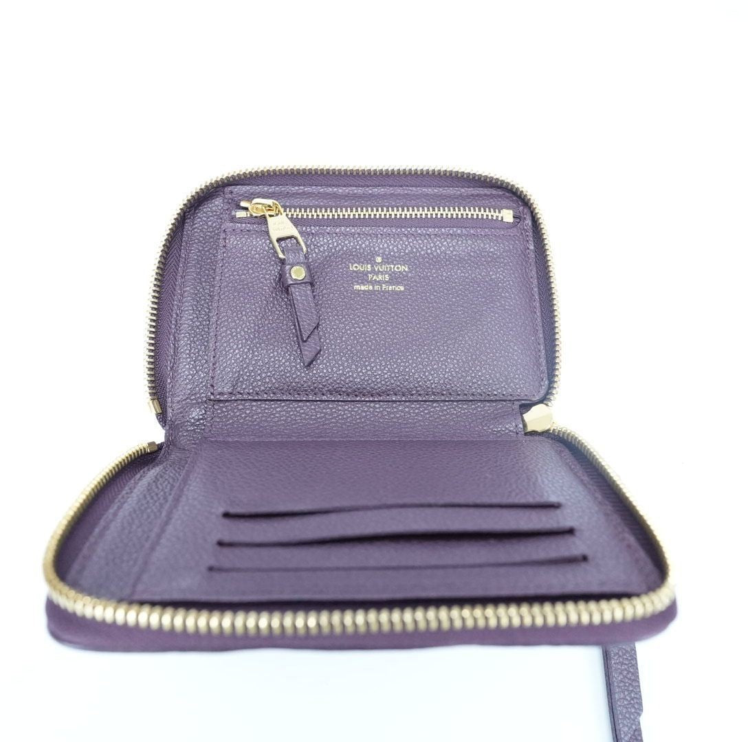 LOUIS VUITTON Monogram Empreinte Portefeuille Secrète Compact Wallet M60296