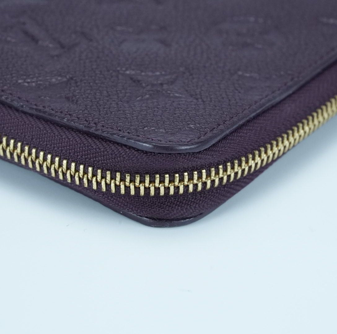 LOUIS VUITTON Monogram Empreinte Portefeuille Secrète Compact Wallet M60296