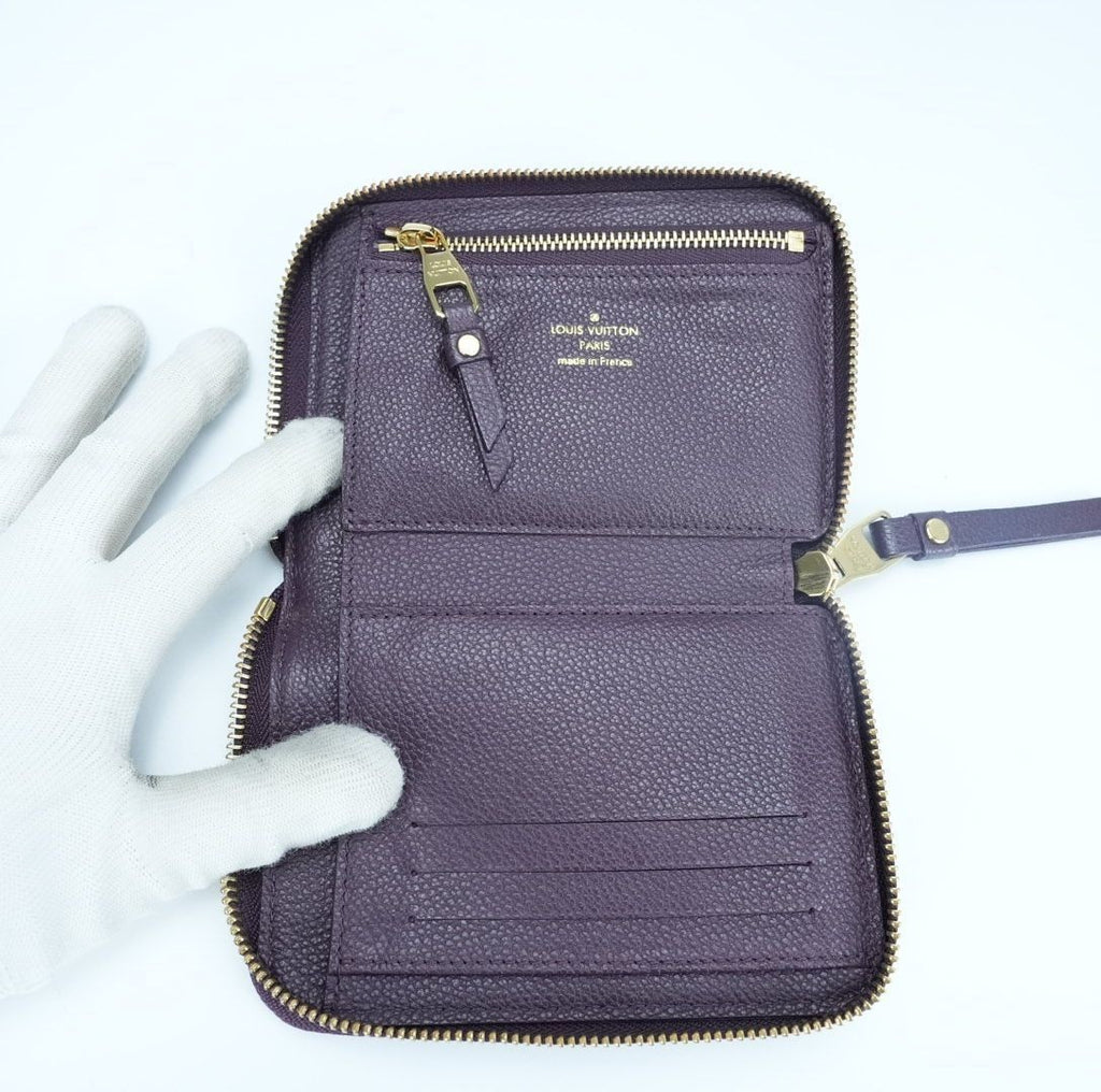 LOUIS VUITTON Monogram Empreinte Portefeuille Secrète Compact Wallet M60296