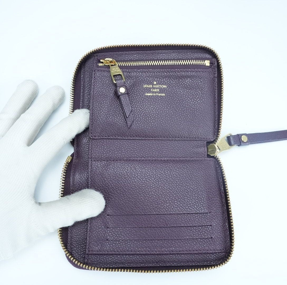 LOUIS VUITTON Monogram Empreinte Portefeuille Secrète Compact Wallet M60296