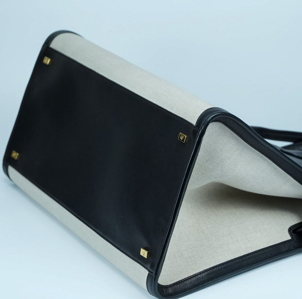 THE ROW Margaux 15 Canvas and Leather Handbag in Black and Beige