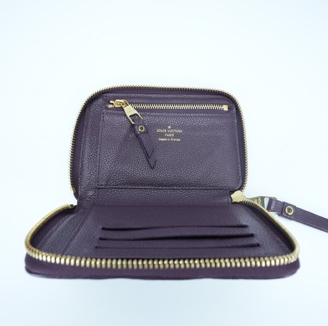 LOUIS VUITTON Monogram Empreinte Portefeuille Secrète Compact Wallet M60296