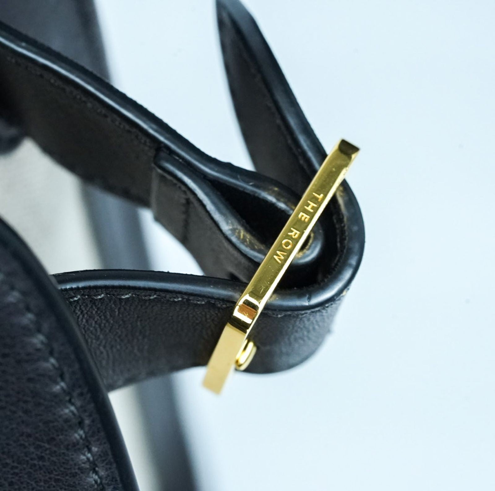 THE ROW Margaux 15 Canvas and Leather Handbag in Black and Beige