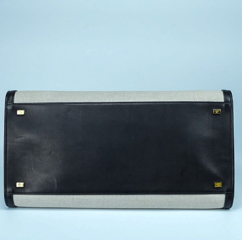 THE ROW Margaux 15 Canvas and Leather Handbag in Black and Beige