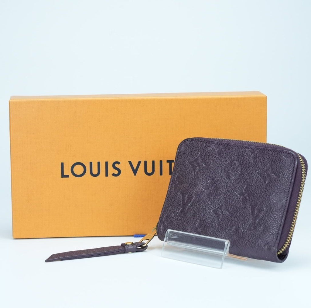 LOUIS VUITTON Monogram Empreinte Portefeuille Secrète Compact Wallet M60296